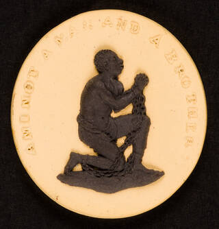 yellow and black oval medallion