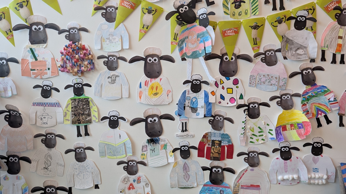 Images of sheep on wall